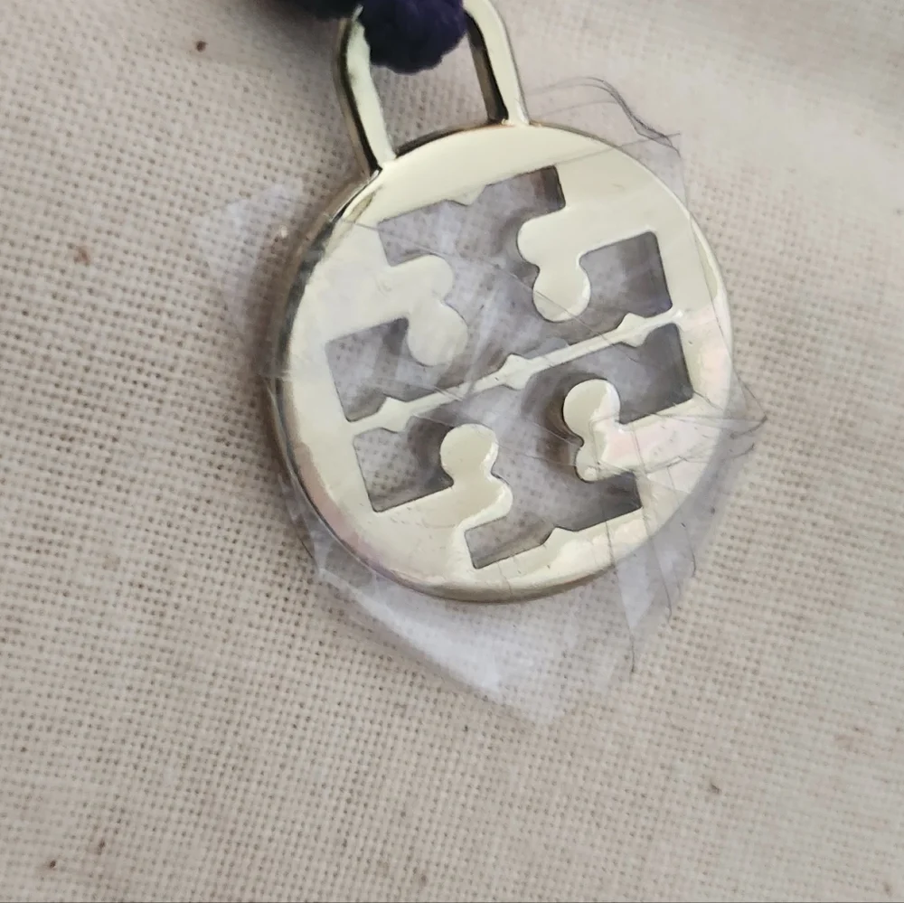 Tory Burch.Dust Cover Bag 23